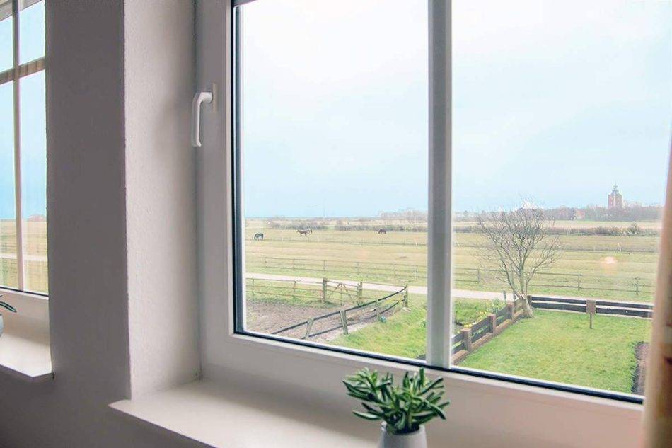 View Over The Salt Marshes Towards The Lighthouse And Cuxhaven In The Suite Scharhörn In The Hotel Nige Hus On The Island Neuwerk.