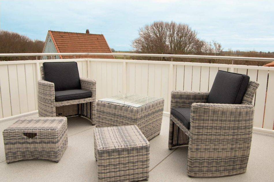 Balcony With Cozy Seating Area And Storage Table, 1st Floor In The Annex On The Dike In The Superior Double Room Vogelsand In Hotel Nige Hus On The Island Of Neuwerk.