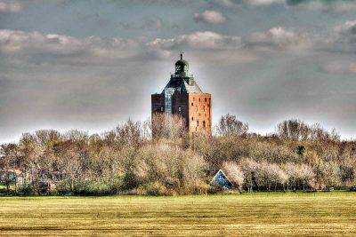 The Imposing Neuwerk Lighthouse Rises Above The Island.